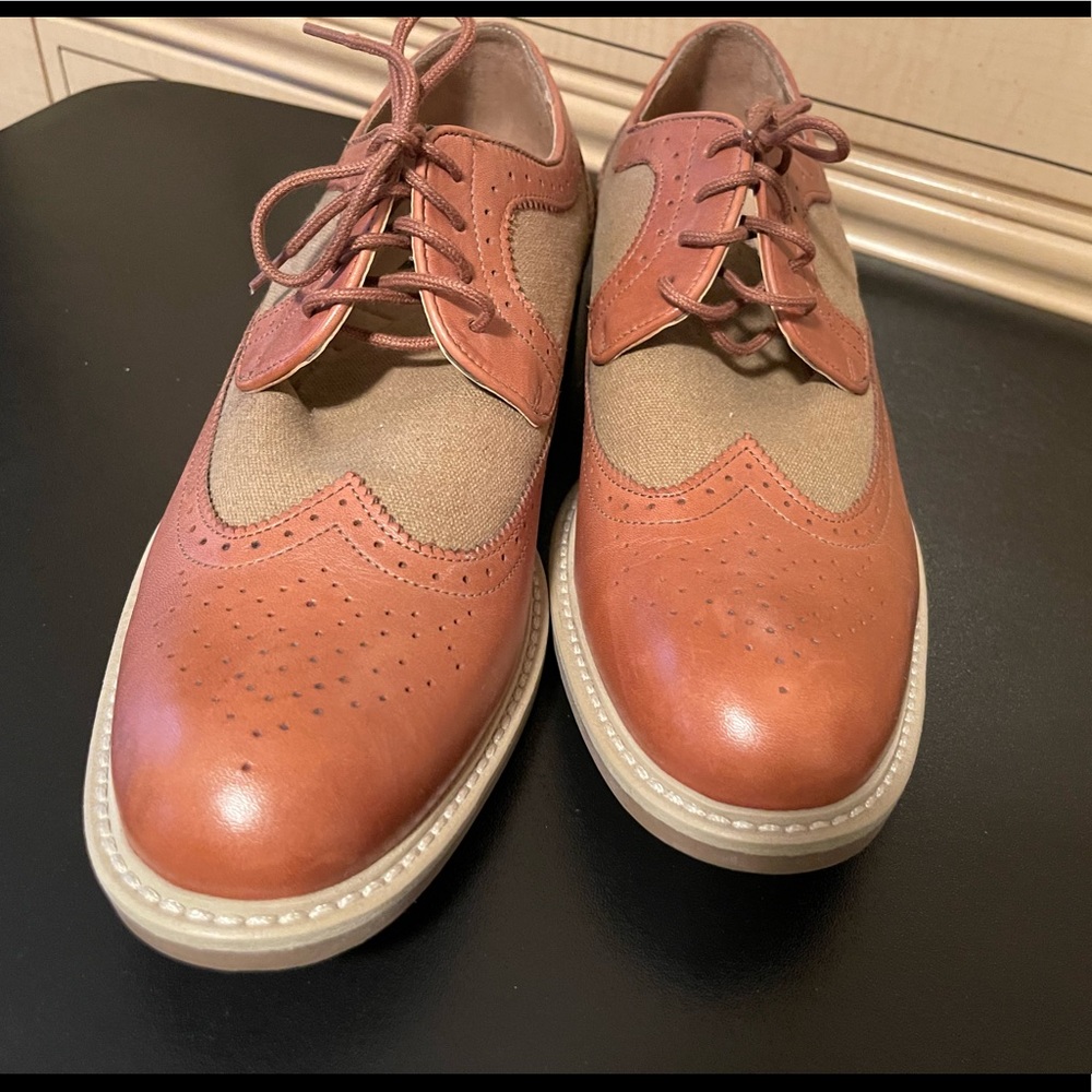 Dress Shoes. Leather Upper. Excellent shape. Worn once. They are narrow